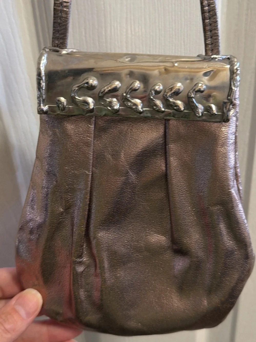 Metallic Bronze Crossbody Bag with Silver Sculptural Accent and Amethyst Details